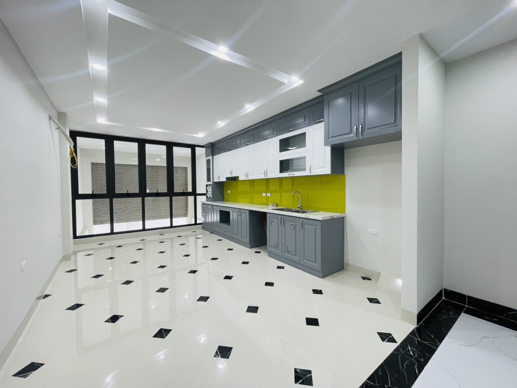 Bán nhà Định Công Thượng - diện tích 50m2 7 tầng - Ô TÔ ĐỖ CỬA - giá 14,6 tỷ