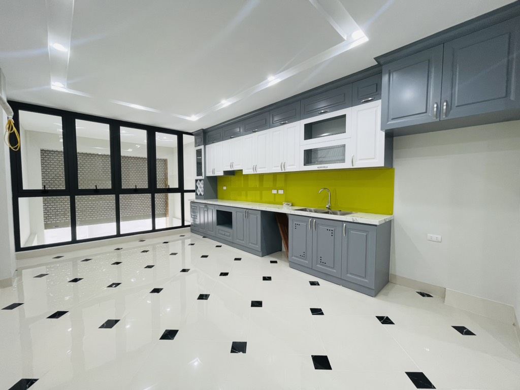 Bán nhà Định Công Thượng - diện tích 50m2 7 tầng - Ô TÔ ĐỖ CỬA - giá 14,6 tỷ