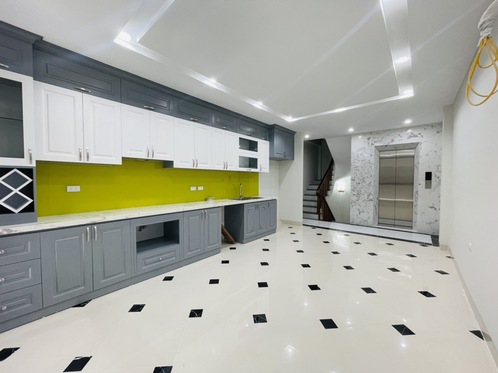 Bán nhà Định Công Thượng - diện tích 50m2 7 tầng - Ô TÔ ĐỖ CỬA - giá 14,6 tỷ