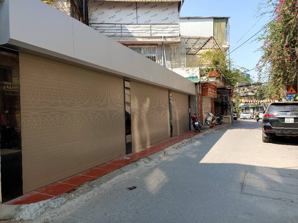 Bán nhà Mai Động - diện tích 92m2 1 tầng - Ô TÔ TRÁNH - giá 14,5 tỷ