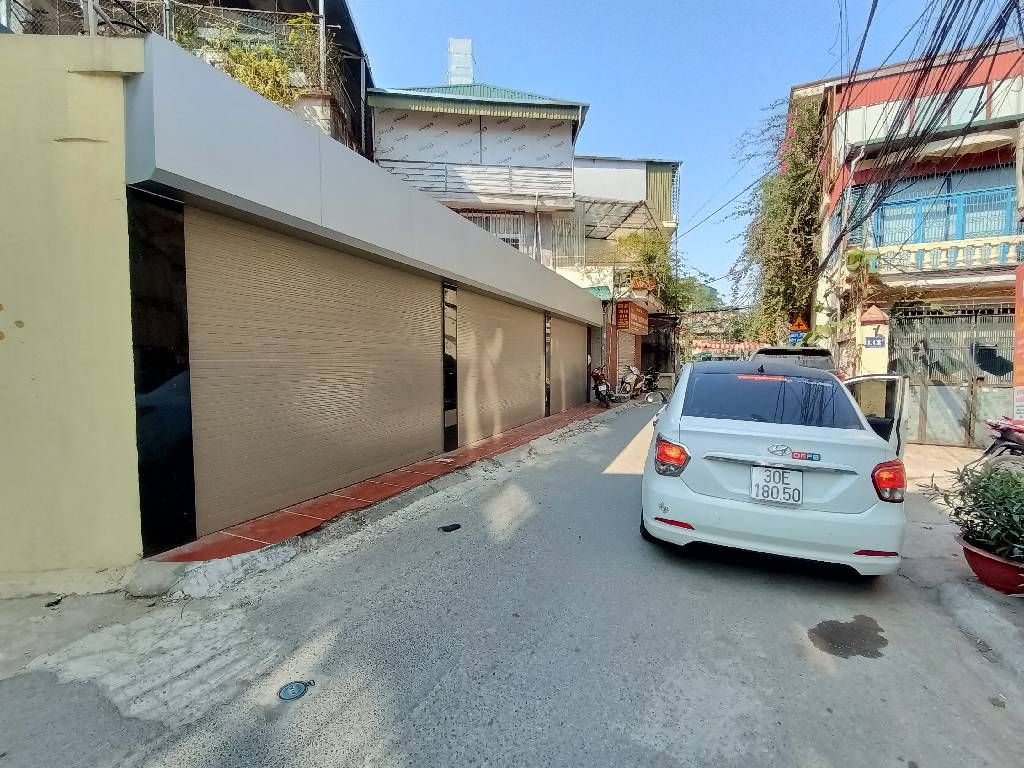 Bán nhà Mai Động - diện tích 92m2 1 tầng - Ô TÔ TRÁNH - giá 14,5 tỷ