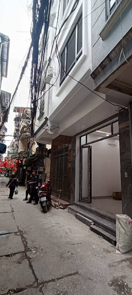 Bán nhà Tân Mai - diện tích 26m2 6 tầng - Ô TÔ ĐỖ CỬA - giá 9,8 tỷ