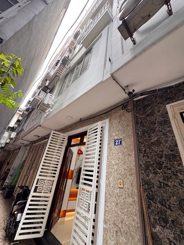 Bán nhà ngõ Quỳnh - diện tích 30,2m2 5 tầng - Ô TÔ ĐỖ CỔNG - giá 10,35 tỷ