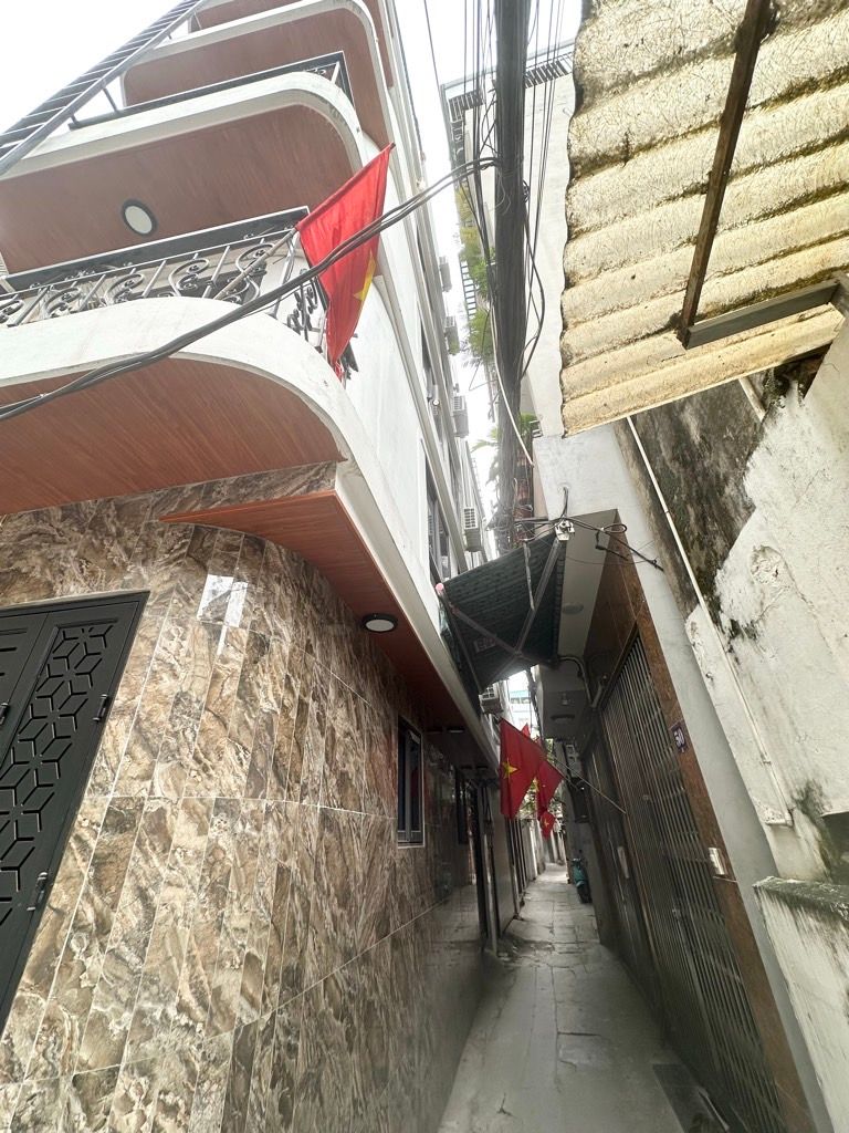 Bán nhà Hoà Bình - diện tích 51.2m2 7 tầng - Lô góc 3 mặt ngõ - giá 15,8 tỷ