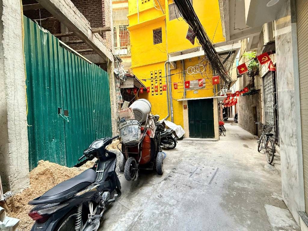 Bán nhà An Trạch - diện tích 37m2 7 tầng - Ô tô đỗ cửa - giá 11,8 tỷ